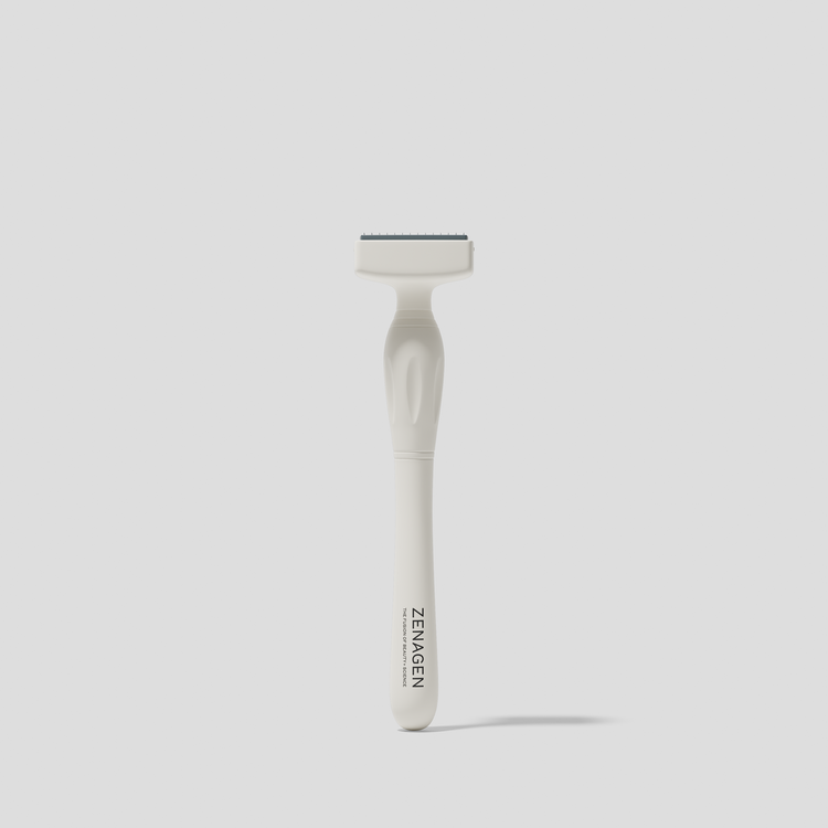 White safety razor with 'ZENAGEN' branding on a light gray background
